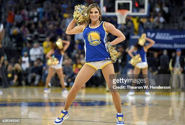 The Golden State Warriors dance team performs during an NBA basketball game between the Houston Rockets and Golden State Warriors at ORACLE Arena on...