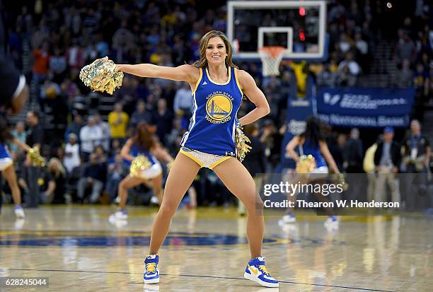 The Golden State Warriors dance team performs during an NBA basketball game between the Houston Rockets and Golden State Warriors at ORACLE Arena on...