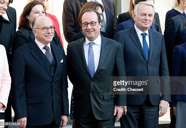 Newly appointed Prime Minister Bernard Cazeneuve, French President Francois Hollande and Jean-Marc Ayrault, French Minister of Foreign Affairs and...