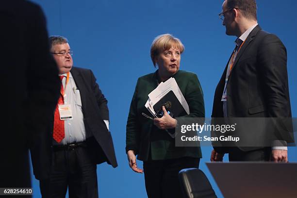 German Chancellor and Chairwoman of the German Christian Democrats Angela Merkel departs at the conclusion of the 29th federal congress of the CDU on...