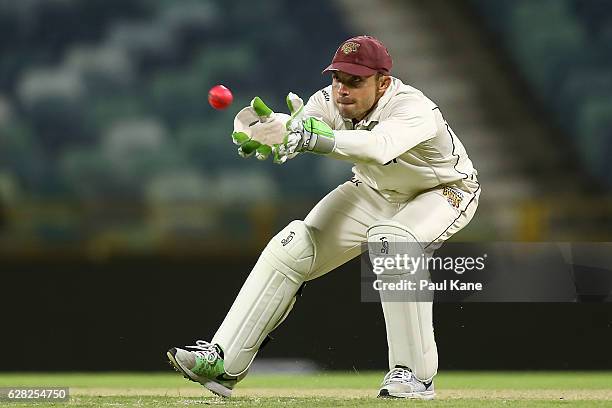 Chris Hartley of Queensland takes a return throw during day three of the Sheffield Shield match between Western Australia and Queensland at WACA on...