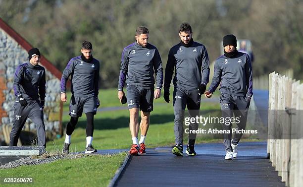 Gylfi Sigurdsson, Borja Gonzalez, Angel Rangel, Jordi Amat and Jefferson Montero walk to the pitch prior to the Swansea City Training at The Fairwood...