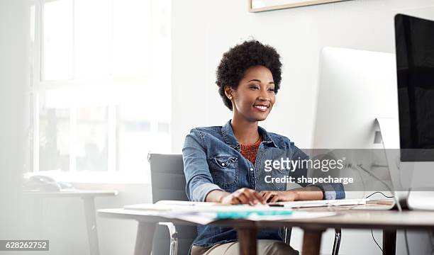 working with a smile - desktop pc stock pictures, royalty-free photos & images