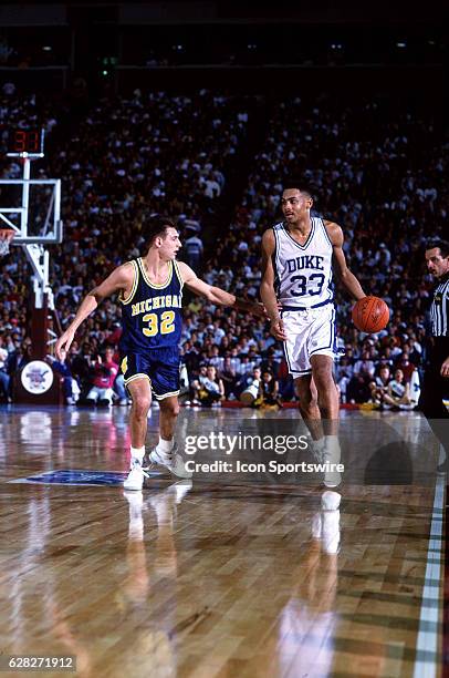 Grant Hill of the Duke Blue Devils dribbles the ball during the Blue Devils 71-51 victory over the Michigan Wolverines in NCAA Championship game at...