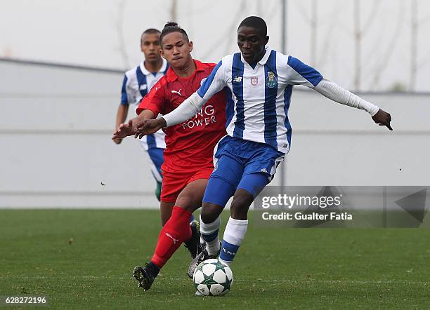 Porto's forward James Artur with Faiq Bolkiah of Leicester City FC in action during the UEFA Youth Champions League match between FC Porto and...