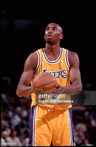 Rookie Kobe Bryant of the Los Angeles Lakers shoots a free throw during a game at the Great Western Forum in Inglewood, CA.