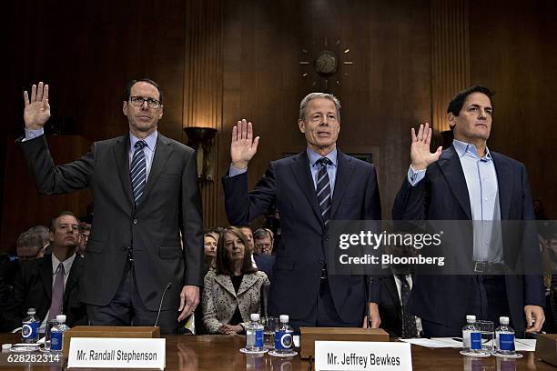 Randall Stephenson, chairman and chief executive officer of AT&T Inc., from left, Jeffrey "Jeff" Bewkes, chairman and chief executive officer of Time...