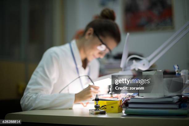 Micro Engineer 415 Micro Electronic Engineering Stock Photos, High-Res Pictures, and ...
