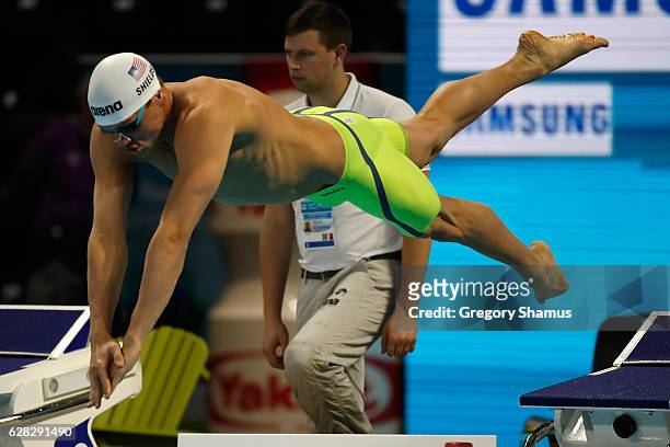 Tom Shields of the United States competes in his preliminary heat of the 100m Butterfly on day two of the 13th FINA World Swimming Championships at...