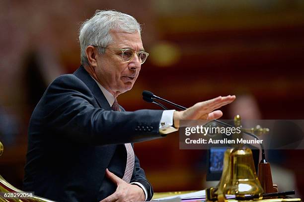 President of the National Assembly Claude Bartolone reacts as Ministers answer deputies during the weekly questions to the government at French...