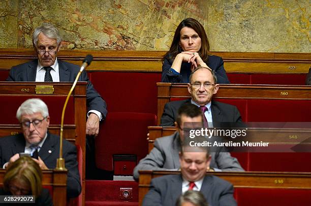 Deputy Aurelie Filippetti reacts as Ministers answer deputies during the weekly questions to the government at French National Assembly on December...