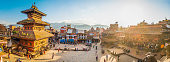Kathmandu golden sunset light illuminating ancient square temples Bhaktapur Nepal