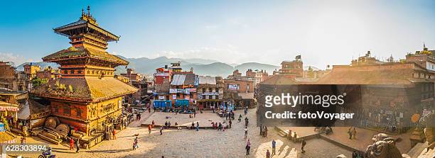 kathmandu golden sunset light illuminating ancient square temples bhaktapur nepal - nepal stock pictures, royalty-free photos & images