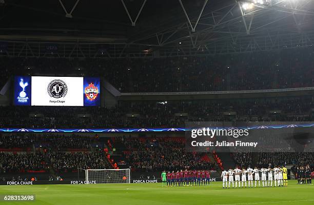 Fans, players and officials observe a minutes silence for the victims of the plane crash involving the Brazilian club Chapecoense prior to kick off...