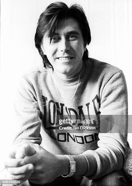 Bryan Ferry, at home wearing a Lonsdale sweatshirt, at the time of his first solo album 'These Foolish Things', London, 1973.