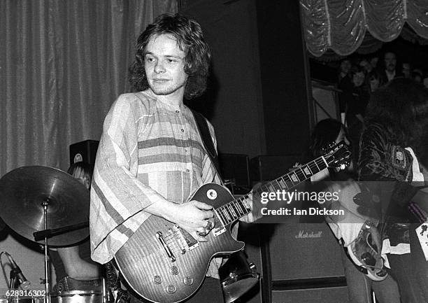 Paul Kossoff of English blues rock band Free performing on stage in United Kingdom, 1972. He is playing a Gibson Les Paul Standard guitar.