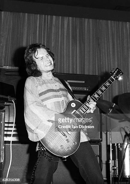 Paul Kossoff of English blues rock band Free performing on stage in United Kingdom, 1972. He is playing a Gibson Les Paul Standard guitar.