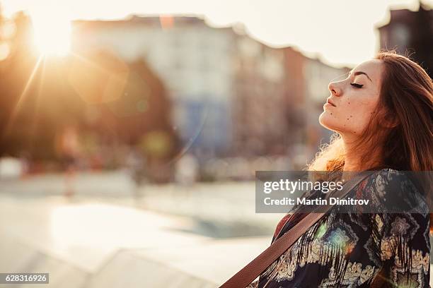 relaxed woman outside - teenager meditating stock pictures, royalty-free photos & images