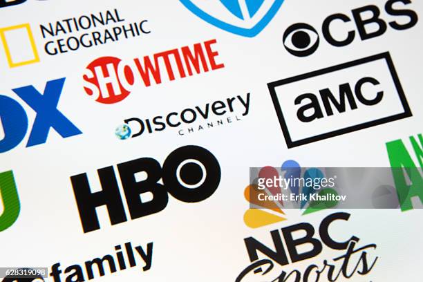 world brand logotypes - media & warner bros stock pictures, royalty-free photos & images