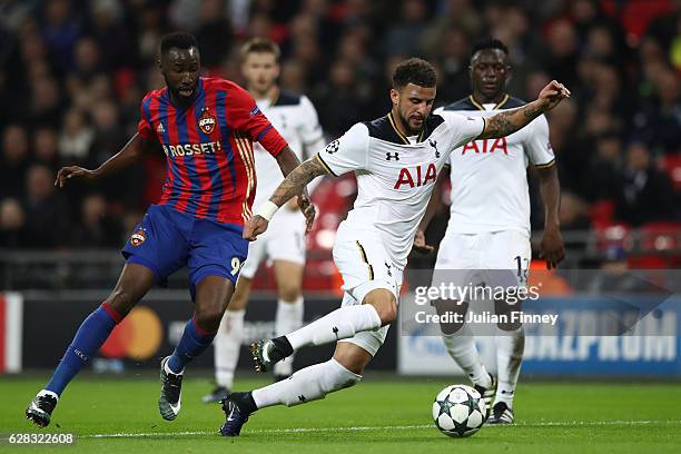 Lacina Traore of CSKA Moscow puts pressure on Kyle Walker of Tottenham Hotspur during the UEFA Champions League Group E match between Tottenham...