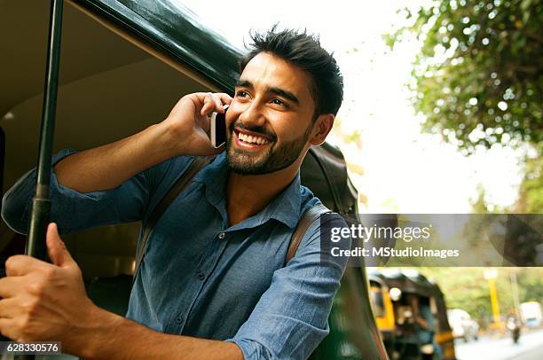 calling from rickshaw. - conversation car bildbanksfoton och bilder