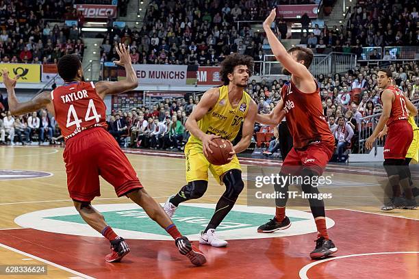 Bryce Taylor of Bayern Muenchen , Danilo Barthel of Bayern Muenchen und Asssem Marei of medi bayreuth battle for the ball during the easyCredit BBL...