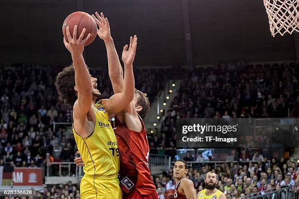 Asssem Marei of medi bayreuth und Danilo Barthel of Bayern Muenchen battle for the ball during the easyCredit BBL match between FC Bayern Muenchen...