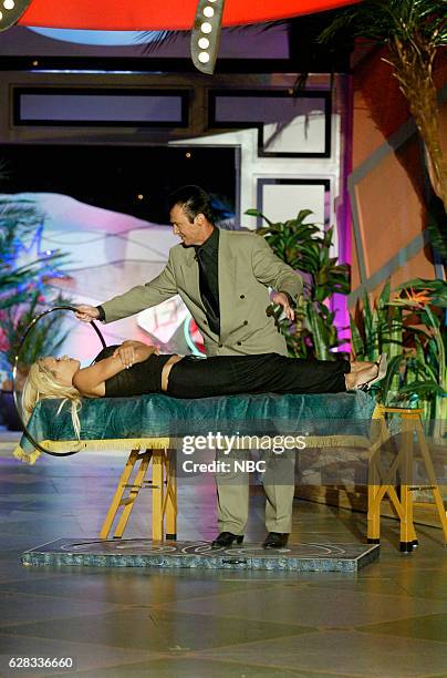 Episode 2708 -- Pictured: Magician Lance Burton and actress Pamela Anderson during a magic trick segment on May 11, 2004 --