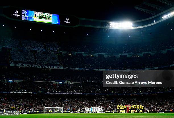 Fans, players and officials observe a minutes silence for the victims of the plane crash involving the Brazilian club Chapecoense prior to kick off...