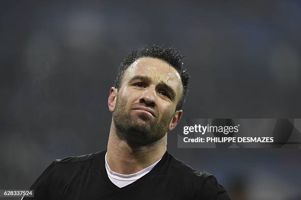 Lyon's French forward Mathieu Valbuena reacts during the UEFA Champions League Group H football match between Olympique Lyonnais and FC Sevilla at...