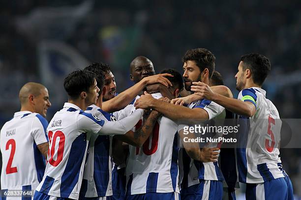 Porto's Portuguese forward Andre Silva celebrates after scoring goal with teammates during the UEFA Champions League Group G, match between FC Porto...