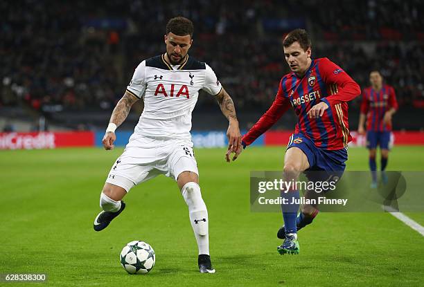 Kyle Walker of Tottenham Hotspur is put under pressure from Georgi Schennikov of CSKA Moscow during the UEFA Champions League Group E match between...