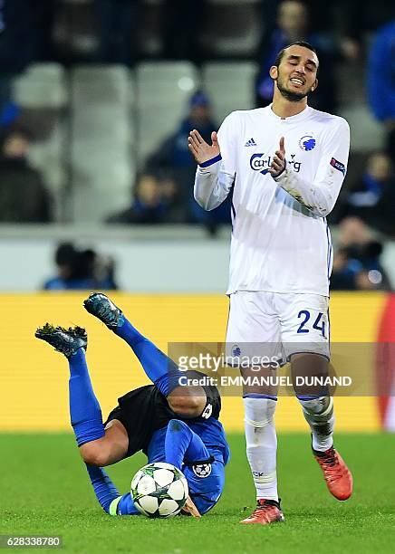 Copenhagen's Youssef Toutouh reacts after fouling Club Brugge's Jelle Vossen during their UEFA Champions League football match at the Jan...