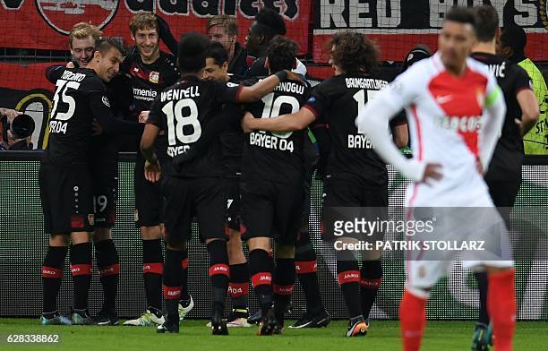 Leverkusen's midfielder Julian Brandt celebrates scoring with his team-mates during the UEFA Champions League group E match between Bayer 04...