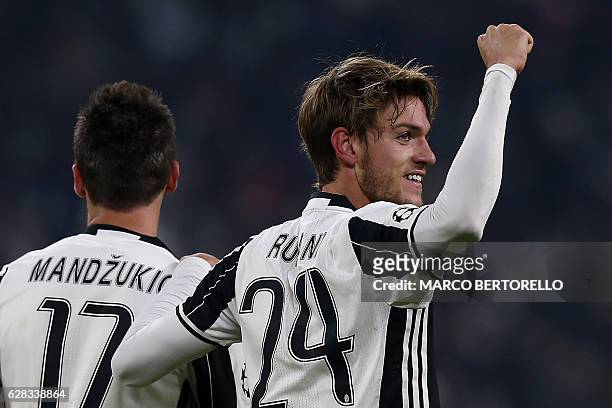 Juventus' defender Daniele Rugani celebrates after scoring during the UEFA Champions League football match Juventus Vs GNK Dinamo Zagreb on December...