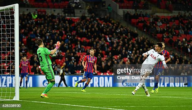 Dele Alli of Tottenham Hotspur shoots which is later turned into the CSKA Moscow goal by Igor Akinfeev of CSKA Moscow for Tottenham Hotspurs third...