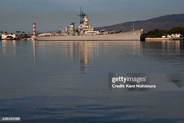 The USS Missouri is shown off of Ford Island during a ceremony commemorating the 75th anniversary of the attack on Pearl Harbor at Kilo Pier on...