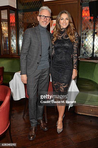 Patrick Cox and Elizabeth Hurley attend an intimate performance with Kylie Minogue at The Ivy to kick off The Ivy 100 Centenary celebrations on...