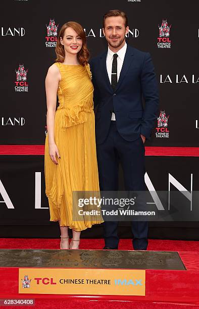 Emma Stone and Ryan Gosling are honored with a Hand & Footprint Ceremony at TCL Chinese Theatre on behalf of Lionsgate's LA LA LAND on December 7,...