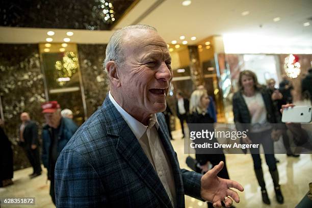Former Dallas Cowboys coach Barry Switzer talks to reporters at Trump Tower, December 7, 2016 in New York City. President-elect Donald Trump and his...