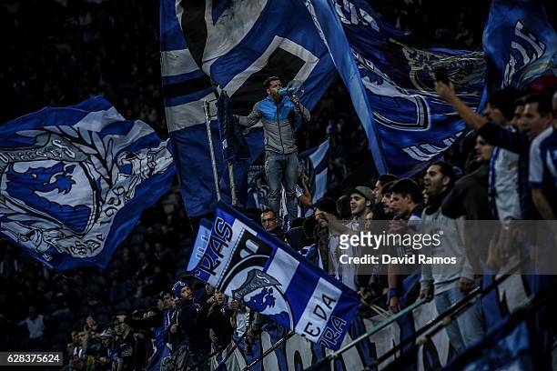 Porto fans cheer on their team during the UEFA Champions League match between FC Porto and Leicester City FC at Estadio do Dragao on December 7, 2016...