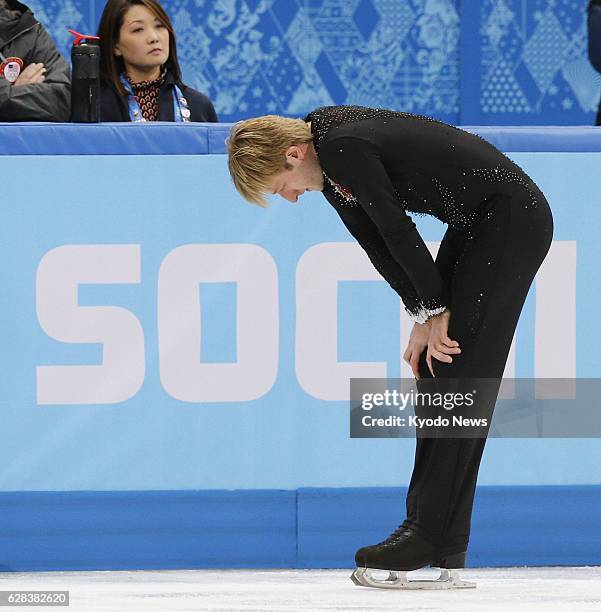 Russia - Evgeni Plushenko of Russia stares down the rink during the 2014 Sochi Winter Olympic Games in Russia on Feb. 13, 2014. He withdrew from the...