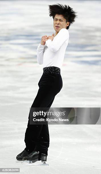 Russia - Tastuki Machida of Japan performs a jump in the men's figure skating short program at the Iceberg Skating Palace during the Winter Olympics...