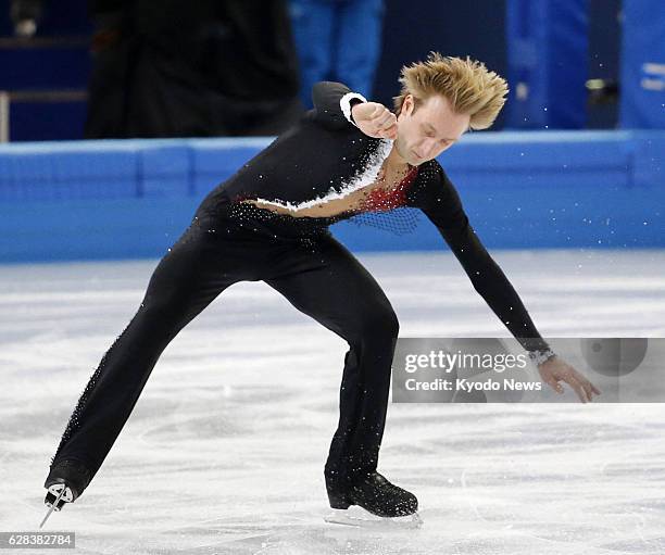 Russia - Evgeni Plushenko of Russia loses his balance during a jump in an official practice session at the Iceberg Skating Palace in Sochi, Russia,...