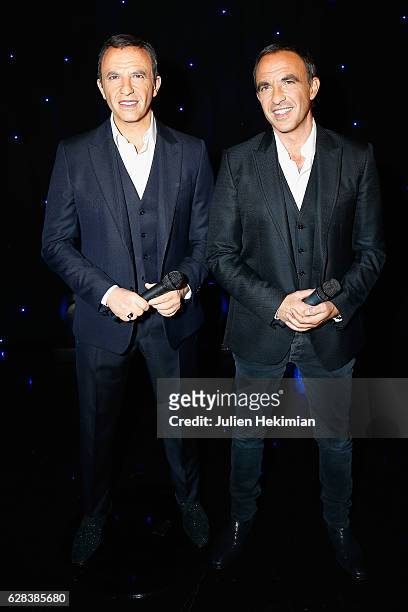 French TV Presenter Nikos Aliagas is pictured with his wax statue during his Wax Work Unveiling celebration at Musee Grevin In Paris at Musee Grevin...