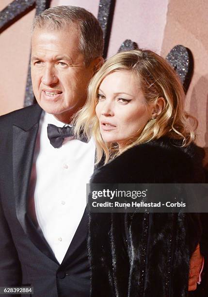 Kate Moss and Mario Testino attend The Fashion Awards 2016 on December 05, 2016 in London, United Kingdom.