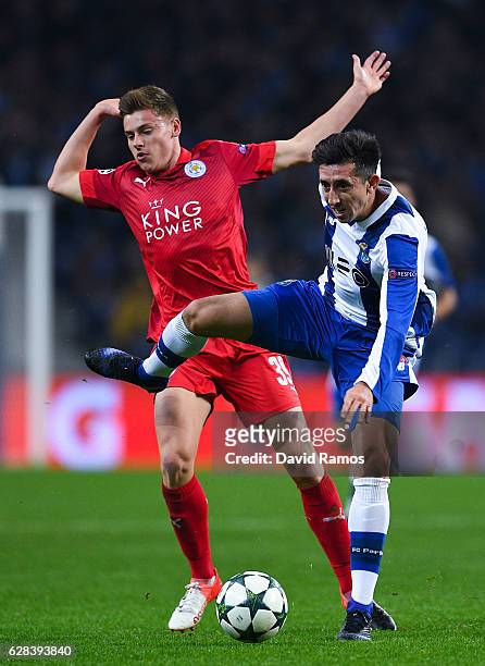Hecor Herrera of FC Porto competes for the ball with Harvey Barnes of Leicester City FC during the UEFA Champions League match between FC Porto and...