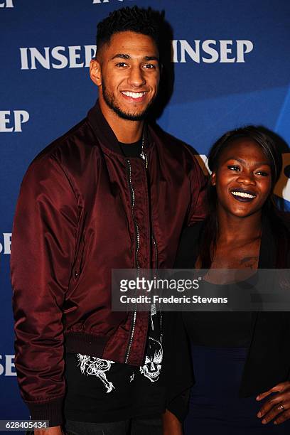 Olympic medalist judoka Clarisse Agbegnenou and boxer Tony Yoka pose at the 9th annual Champions Soiree held at INSEP on December 7, 2016 in Paris,...