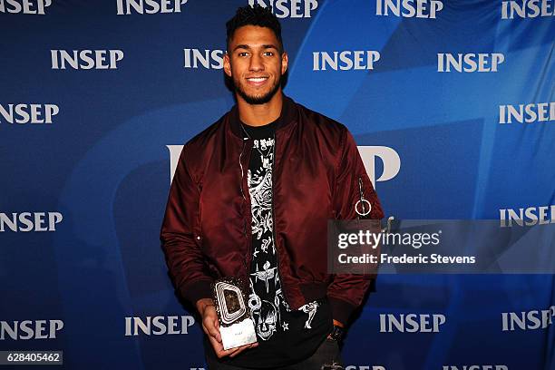 Olympic medalist boxer Tony Yoka poses at the 9th annual Champions Soiree held at INSEP on December 7, 2016 in Paris, France. The reception is an...