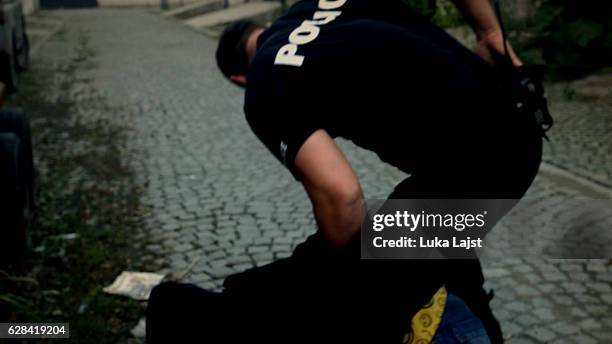 police arresting drugs dealer - arrest stock pictures, royalty-free photos & images